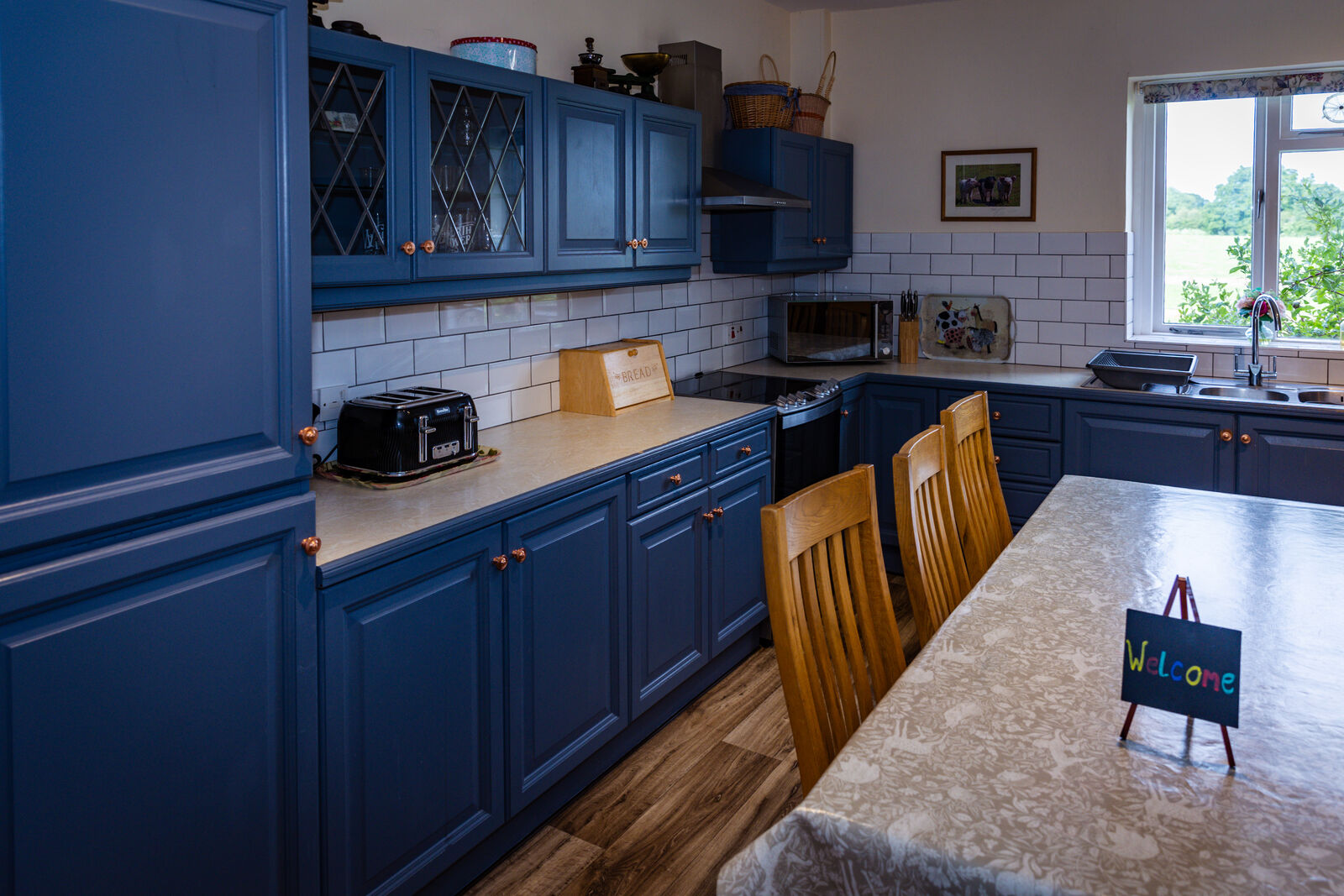 Country-blue farmhouse kitchen, fully equipped for group feasts